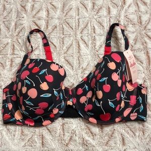 Cacique, NWT women’s black/multi colored cherry T-shirt bra. Size 38DD